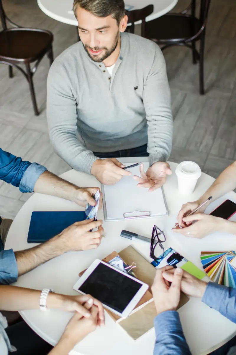 Creative designers sharing ideas during interaction